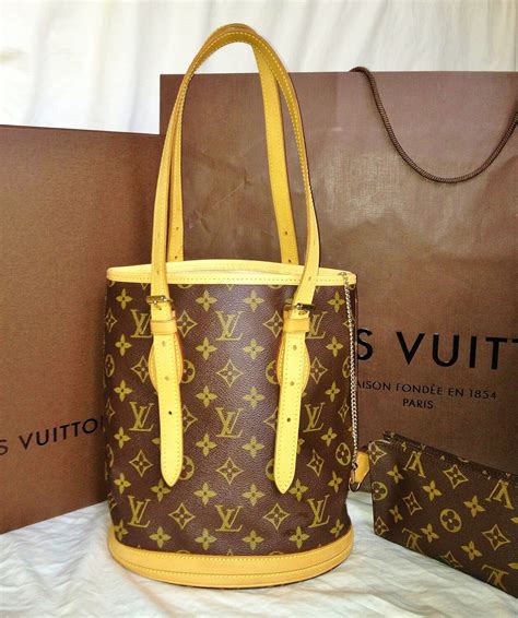 louis vuitton petit bucket fake|Louis Vuitton round bucket bag.